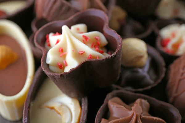 Deliciosos doces de chocolate fundo — Fotografia de Stock