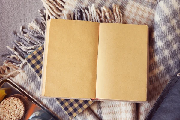 Open book, plaid and coffee — Stock Photo, Image