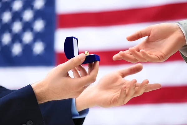 Groom giving wedding ring to man — Stock Photo, Image