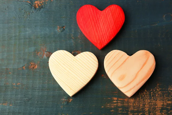 Cuori di legno su sfondo — Foto Stock