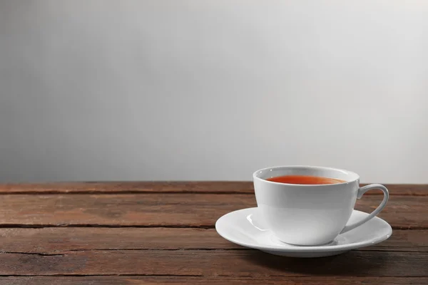 White cup with tea — Stock Photo, Image