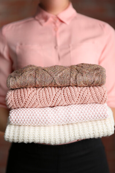 Stack of knitted clothes  