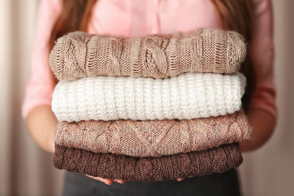Stack of knitted clothes — Stock Photo, Image