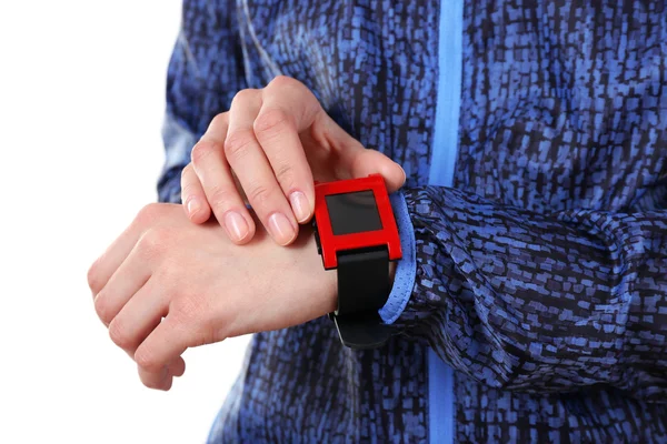 Reloj deportivo rojo en muñeca femenina —  Fotos de Stock