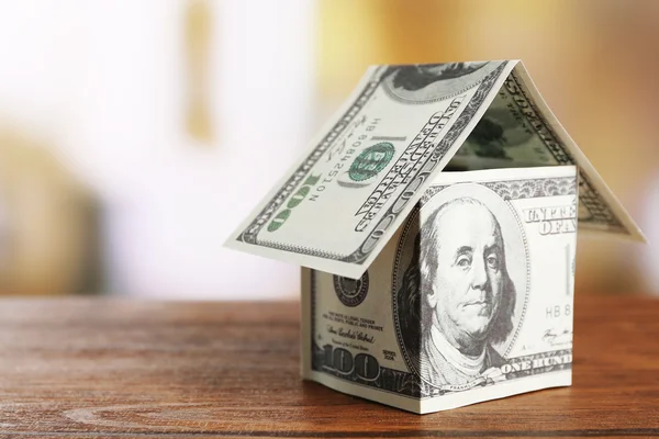 Money house on wooden table — Stock Photo, Image