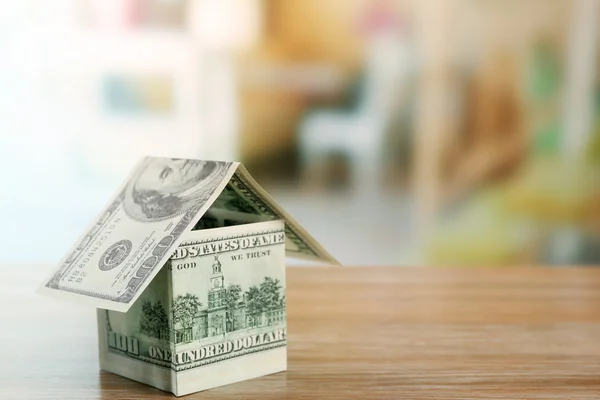 Money house on wooden table — Stock Photo, Image