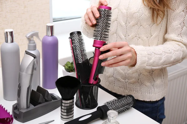 Professional hairdresser and her tools — Stock Photo, Image