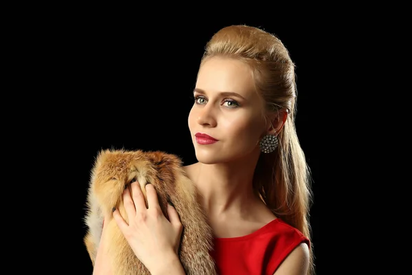 Beautiful young woman with luxury fur — Stock Photo, Image