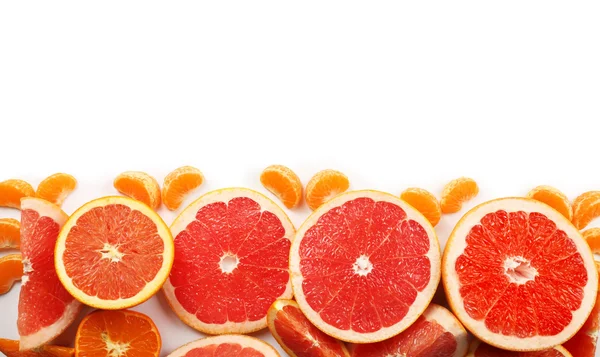 Свежие цитрусовые, включая грейпфруты — стоковое фото