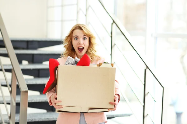 Businesswoman with moving box — Stock Photo, Image