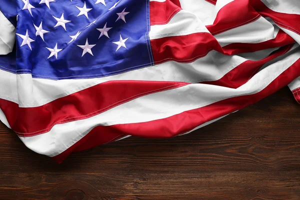 USA flag on wooden table — Stock Photo, Image