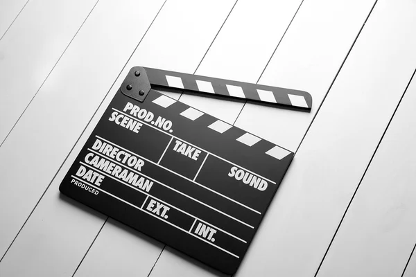 Film Filmklapper op achtergrond — Stockfoto