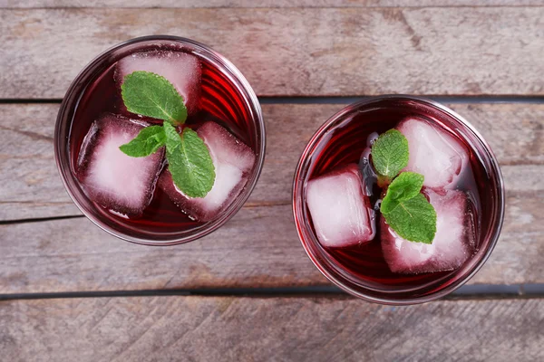 Glasses of cherry soda with ice — Stock Photo, Image