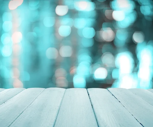 Wooden surface on bokeh background — Stock Photo, Image