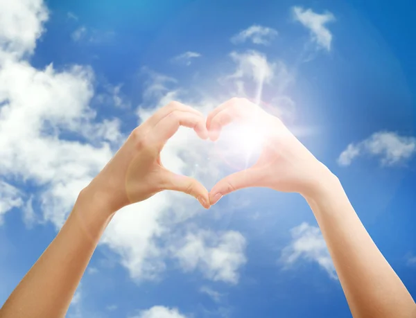 Hands in shape of love heart — Stock Photo, Image