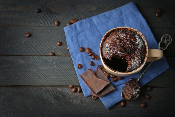 Chocolate fondant cake in cup — Stock Photo, Image