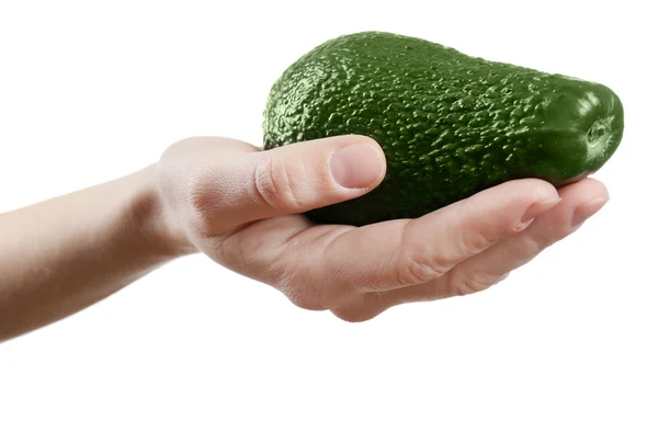 Weibliche Hand mit Avocado — Stockfoto