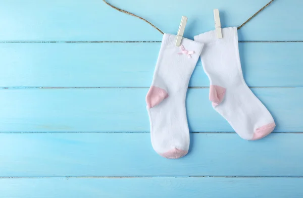 Baby socks hanging — Stock Photo, Image