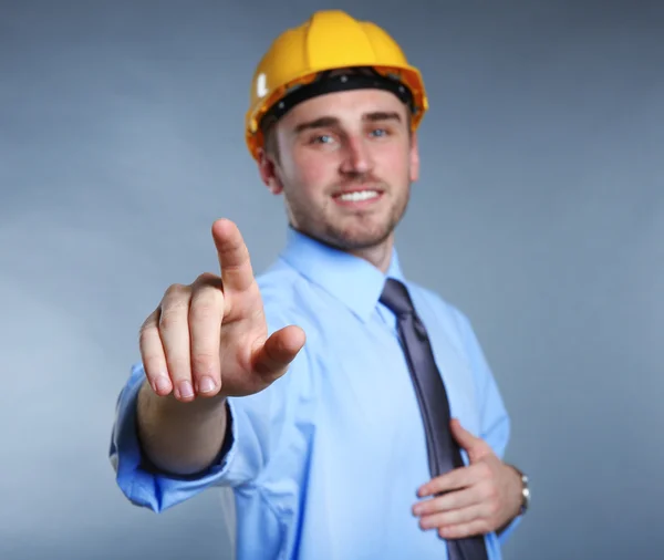 Man in helm making sign with hand — Stok Foto