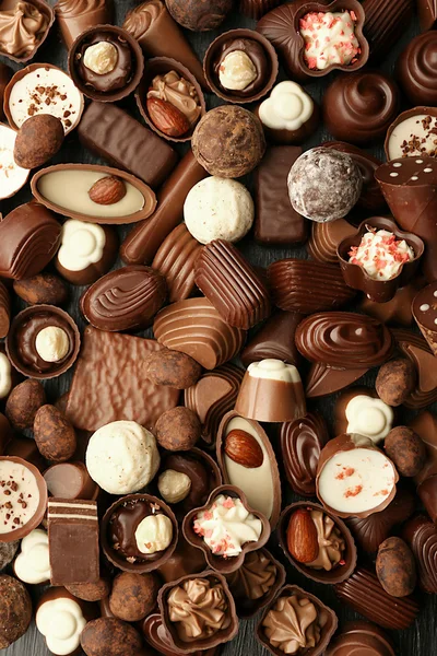 Deliciosos caramelos de chocolate fondo —  Fotos de Stock