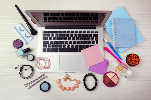 Laptop with woman's accessories — Stock Photo, Image