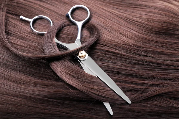 Hairdresser's scissors with  hair — Stock Photo, Image