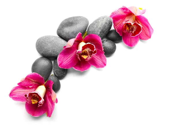 Spa stones and red orchids — Stock Photo, Image