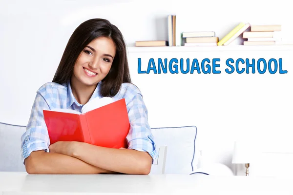 Language school concept with young woman — Stock Photo, Image