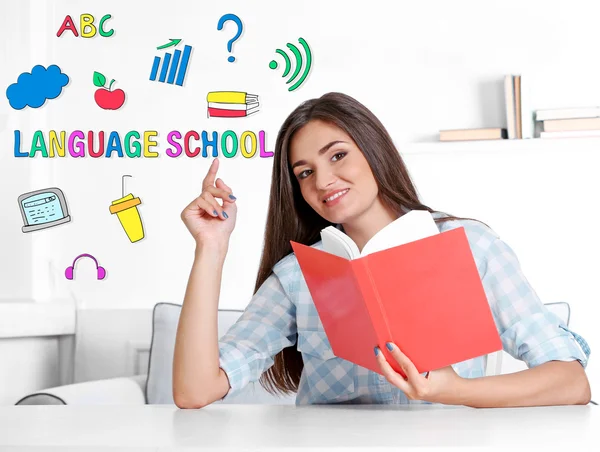 Language school concept with young woman — Stock Photo, Image