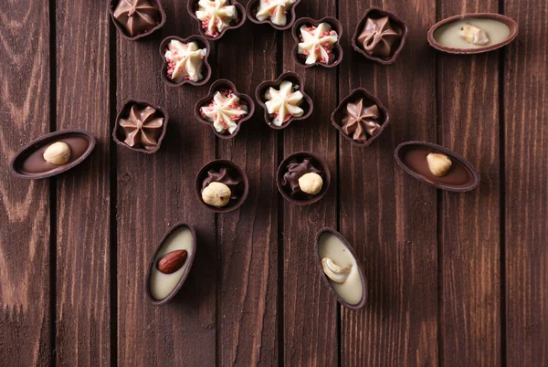 Doces de chocolate no fundo — Fotografia de Stock