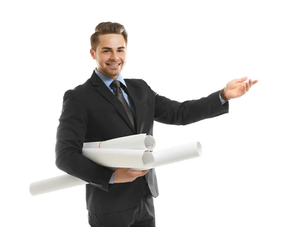 Man in suit holding engineering blueprints — Stock Photo, Image