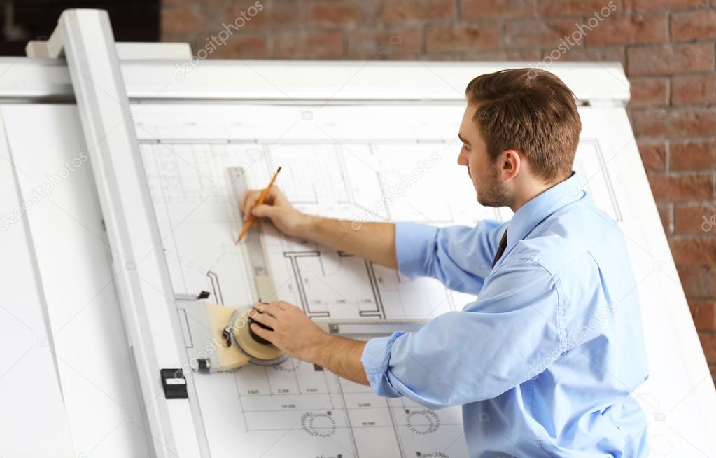 Engineer working with panel board indoors