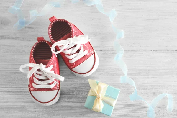 Baby shoes on table — Stock Photo, Image