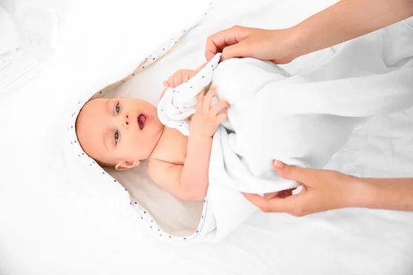 Mother hands and little baby after bath — Stock Photo, Image