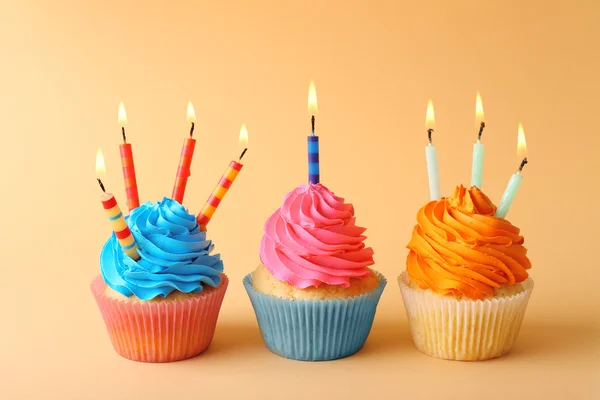 Birthday cupcakes with candles — Stock Photo, Image