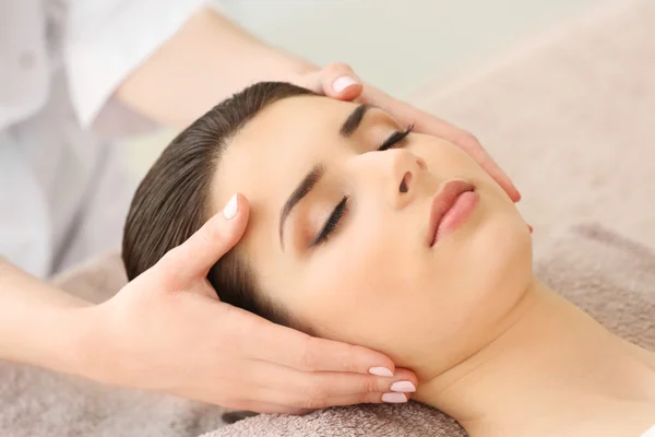 Young woman having massage — Stock Photo, Image