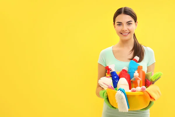 Limpiador femenino sobre fondo —  Fotos de Stock