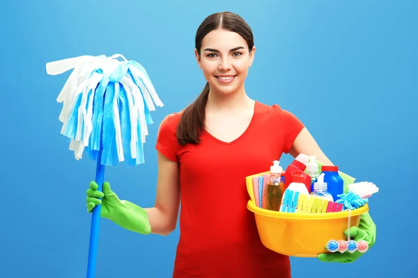 Female cleaner on background — Stock Photo, Image