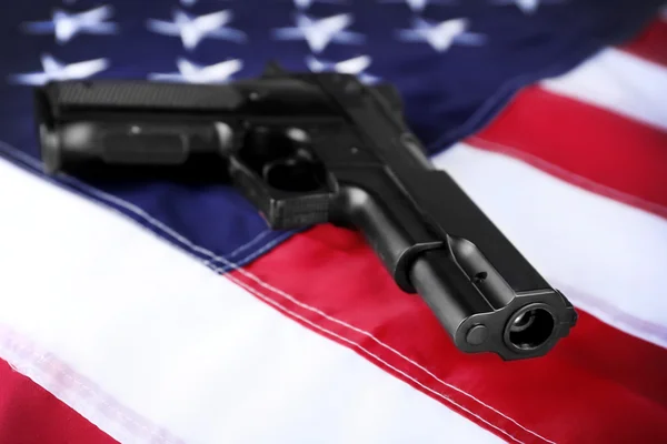 Gun on USA flag — Stock Photo, Image