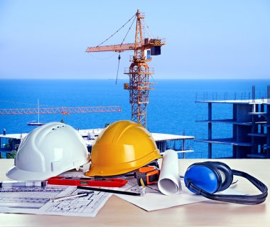Table with construction drawings  clipart