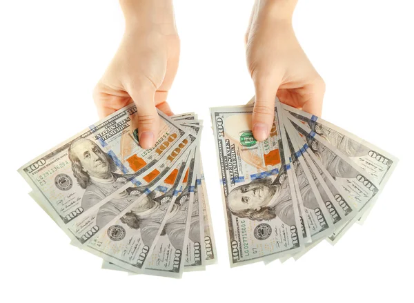 Abanico de dinero en manos femeninas — Foto de Stock