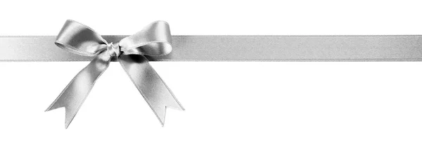 Srebrny jedwabne wstążki z piękny łuk — Zdjęcie stockowe
