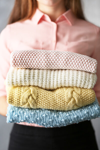 Stack of knitted clothes  