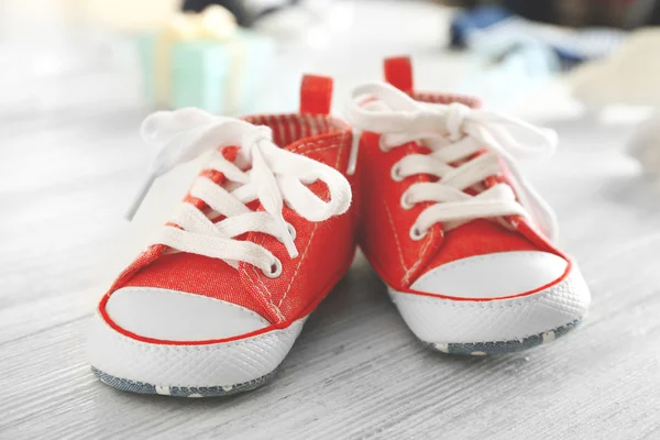 Baby shoes on table — Stock Photo, Image
