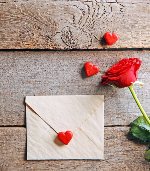 Beautiful rose with gift card — Stock Photo, Image