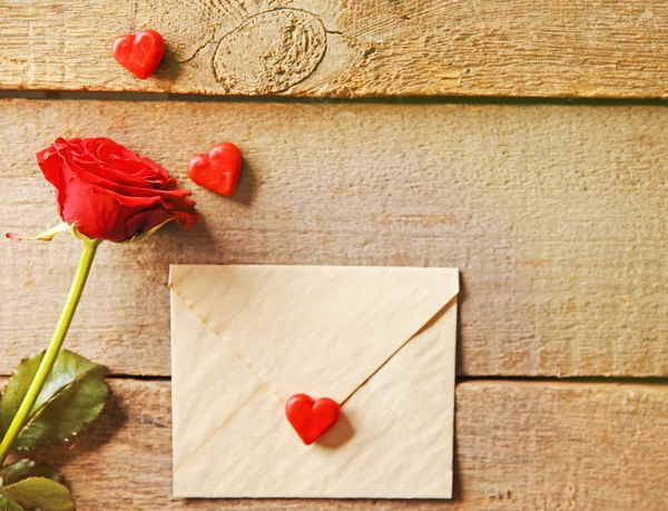 Beautiful rose with gift card — Stock Photo, Image