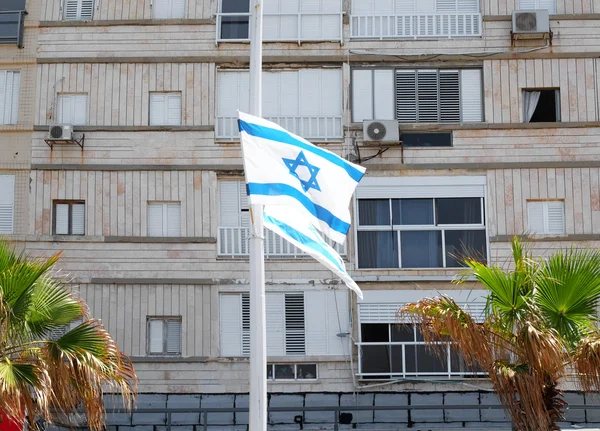 Israel national flag on street — Stock Photo, Image