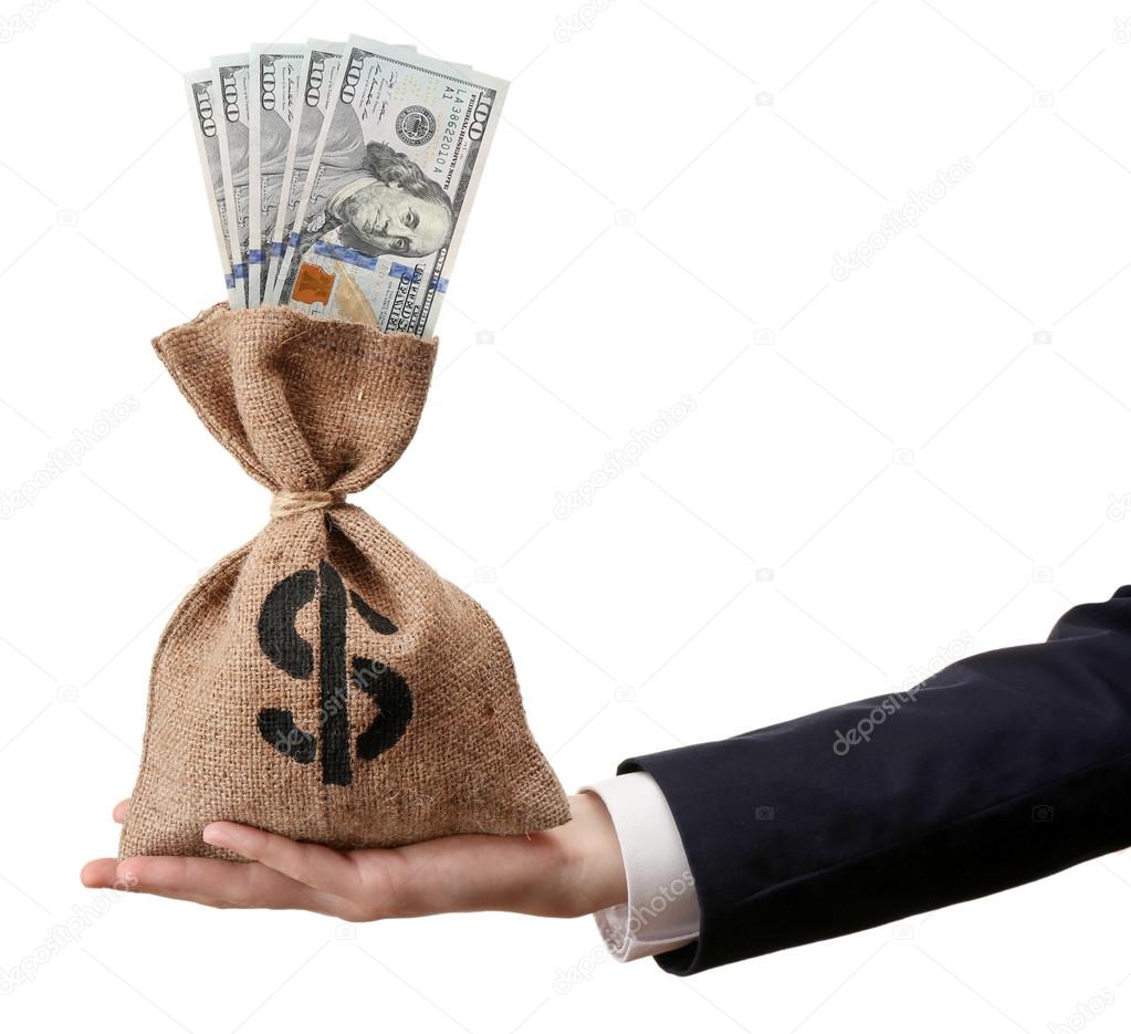 Hand holding money bag Stock Photo by belchonock 112239560