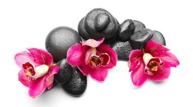 Spa taşlar ve kırmızı orkide
