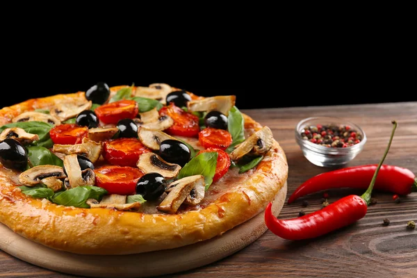 Delicious tasty pizza with ingredients — Stock Photo, Image